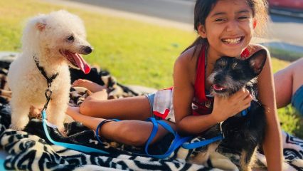 Girl with 2 small dogs