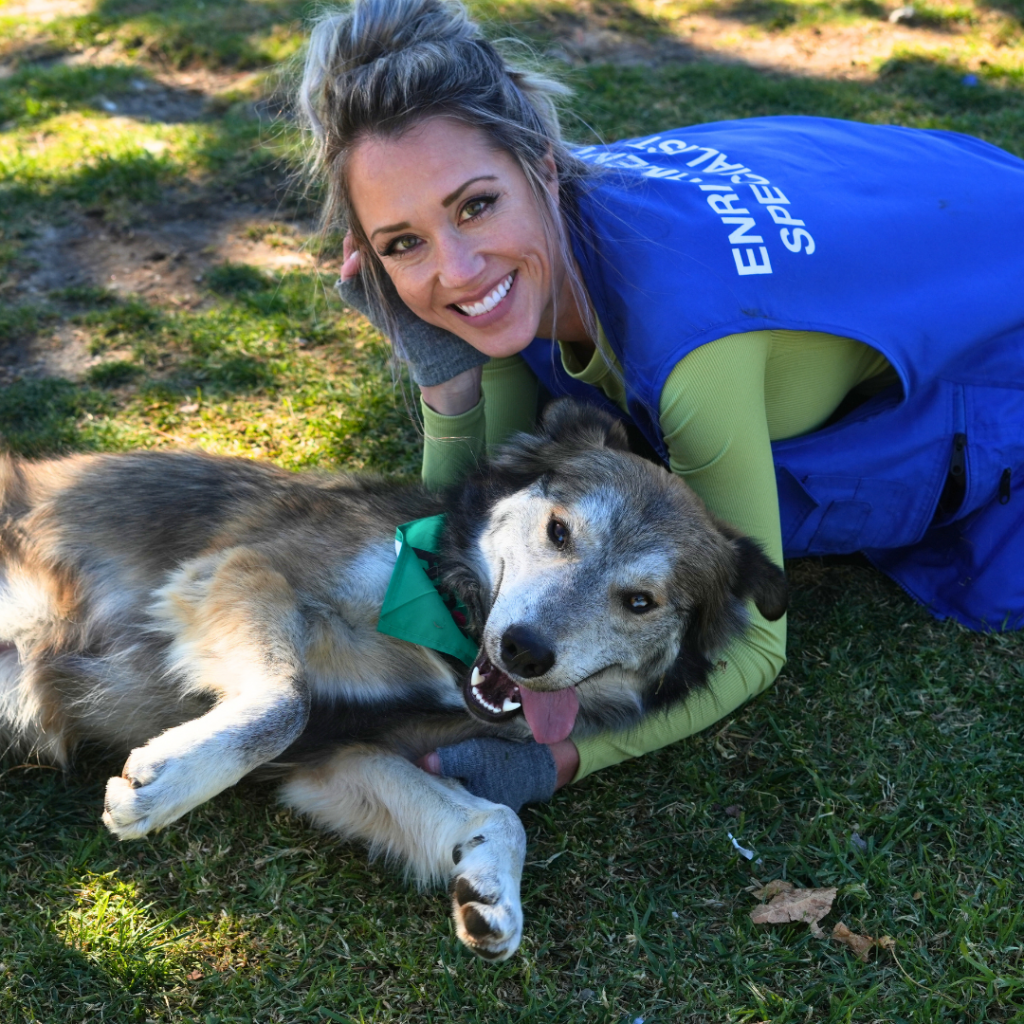 Women with a dog smiling